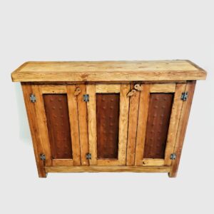 Rustic solid wood sideboard with three hammered metal inset doors, natural brown finish, and iron hardware, handcrafted.